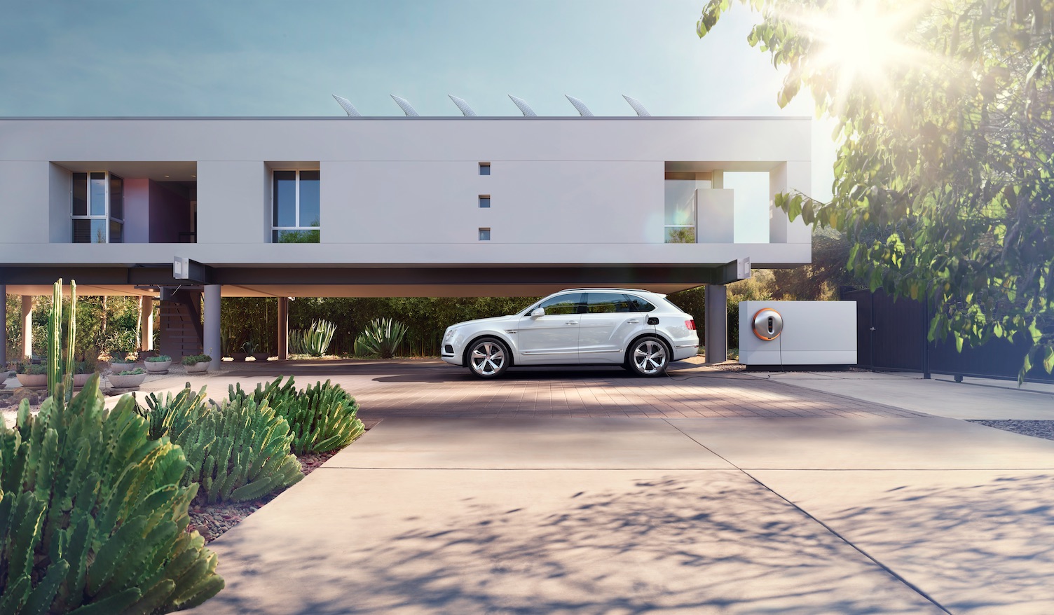 Photo of Bentley Bentayga Plug-In Hybrid with home charging station concept by Philipe Starck.